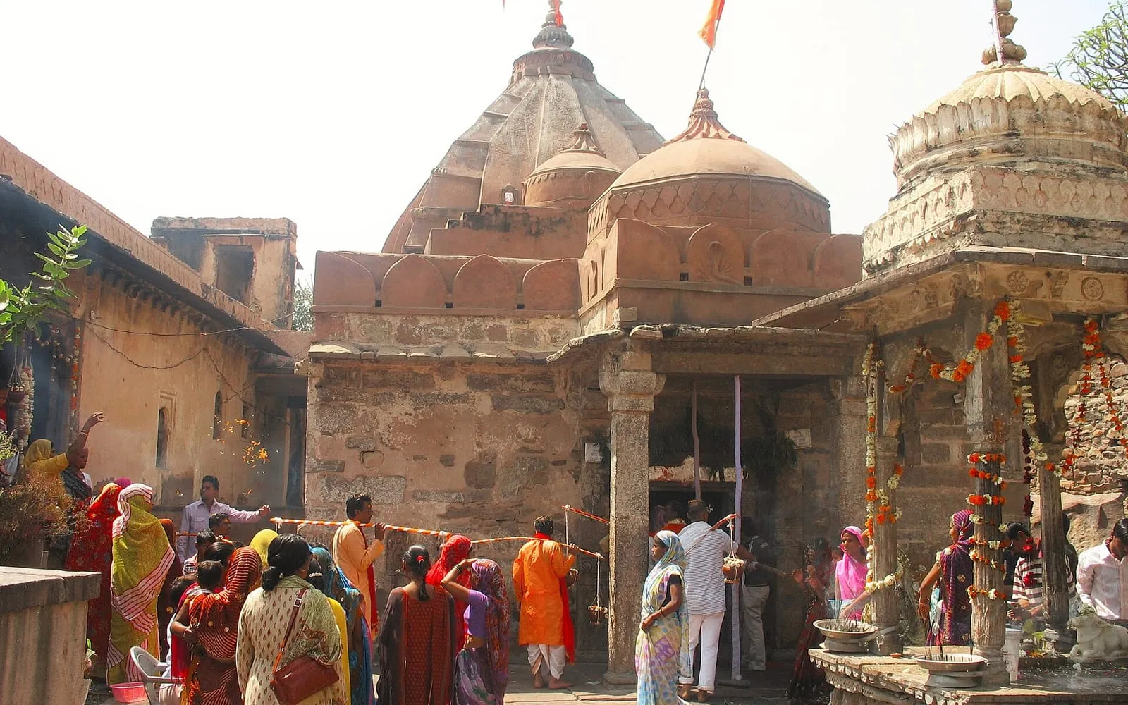 Devotees outside the old stone Kansua Shiva temple in Kota